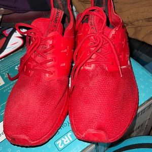 Red sneakers used but still in very good condition
